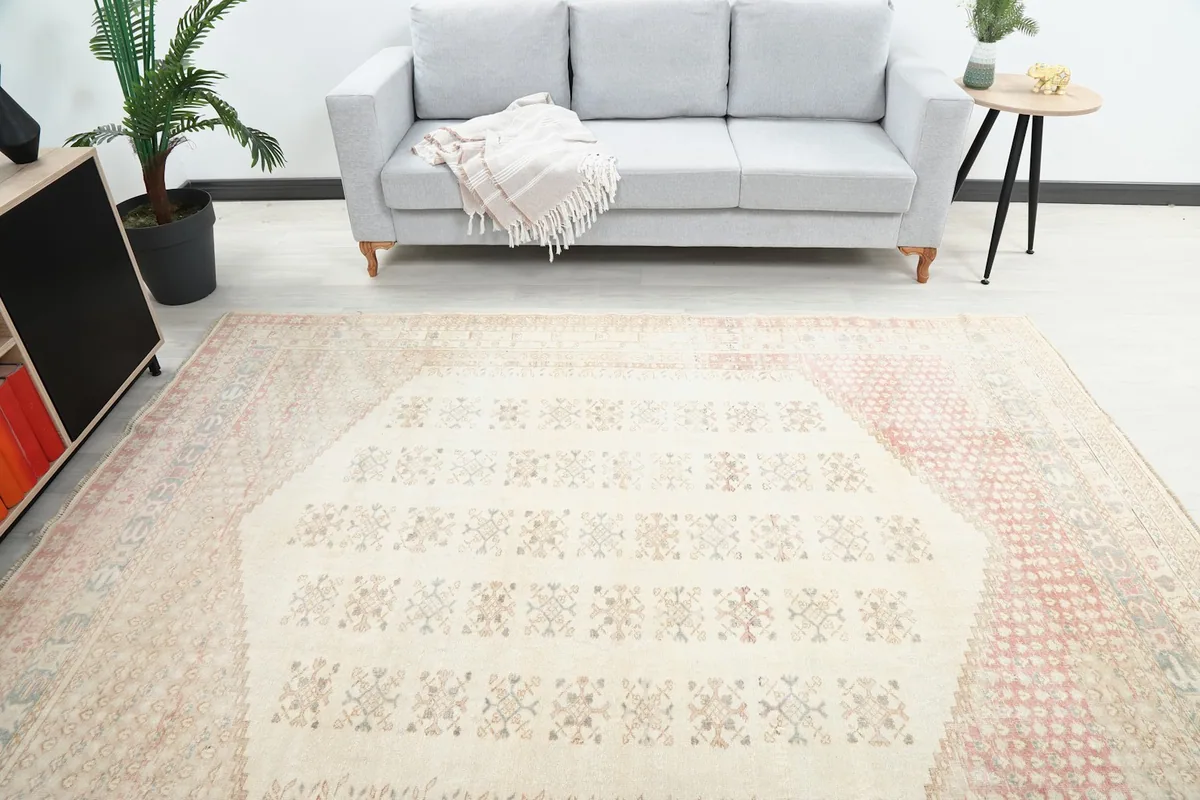Overhead view of the rug showcasing its full pattern and colors within a room