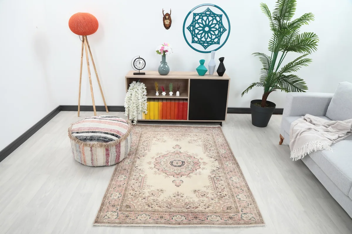 Vintage Anatolian rug displayed in a modern living room setting