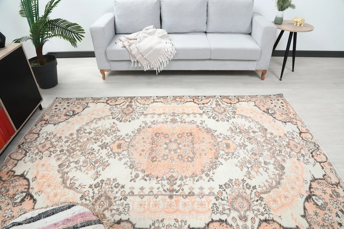 Overhead view of the rug in a room setting, showcasing the full design