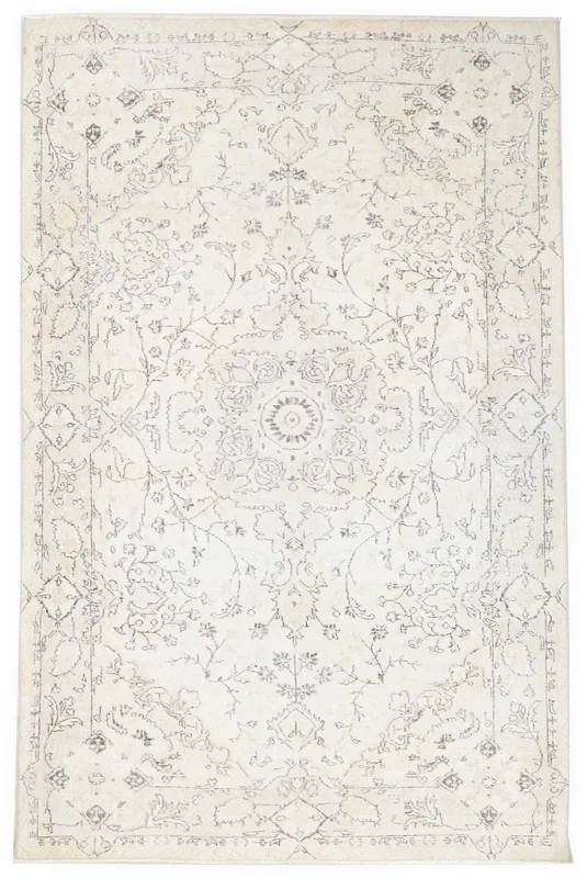 Full top view of the ivory and gray floral medallion vintage Anatolian rug on a white background.