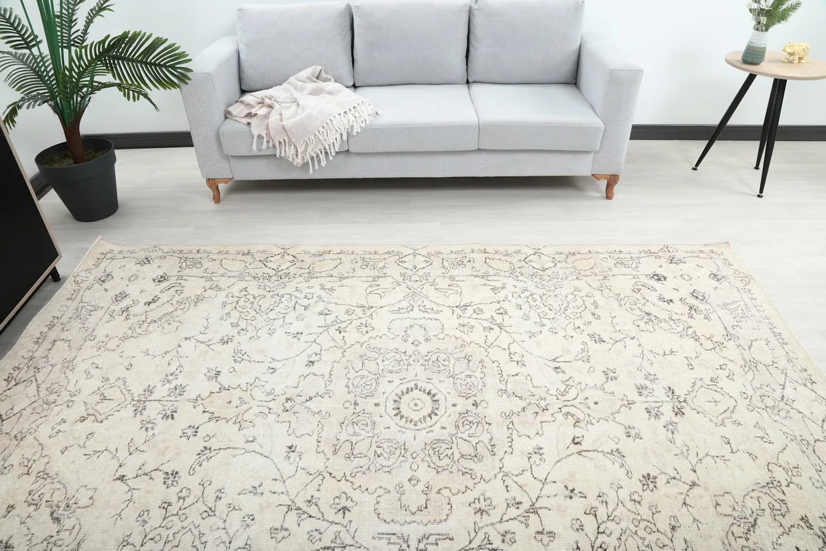 Overhead view of the rug in a room, capturing the full pattern and how it complements the space.