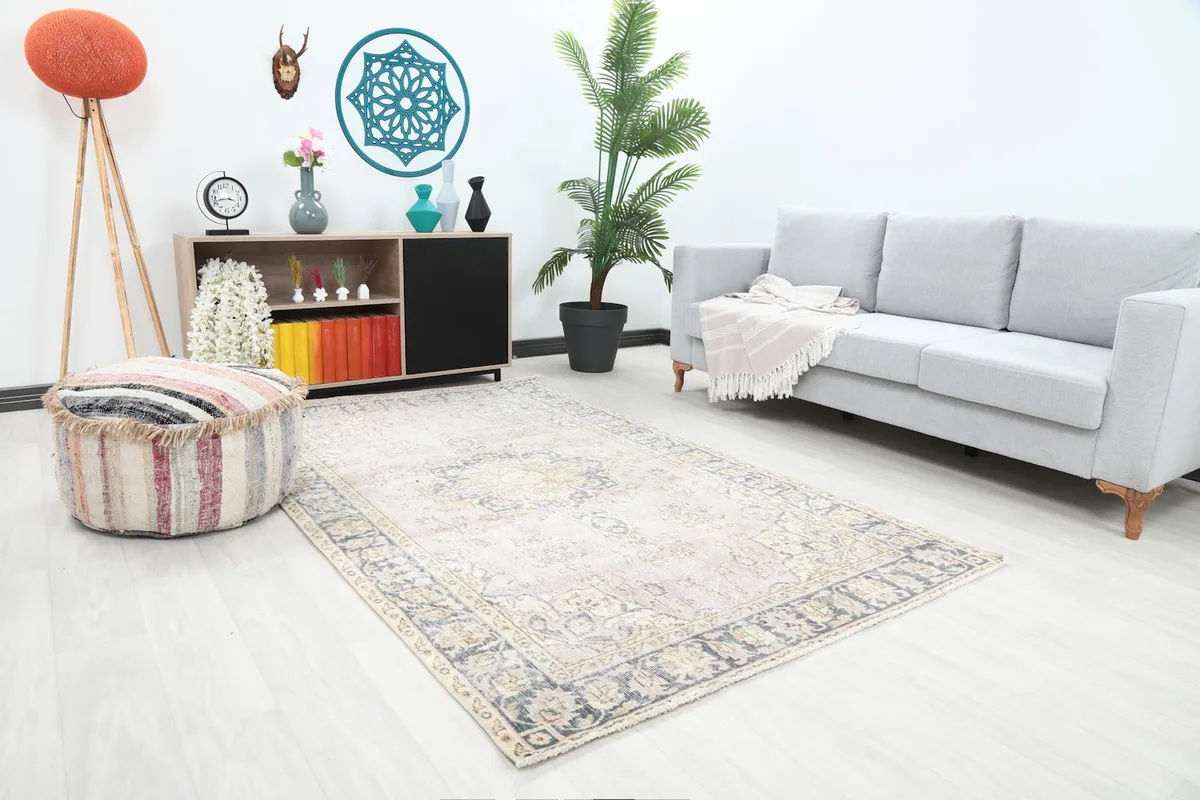 Angle view of the rose Anatolian rug complementing modern living room decor