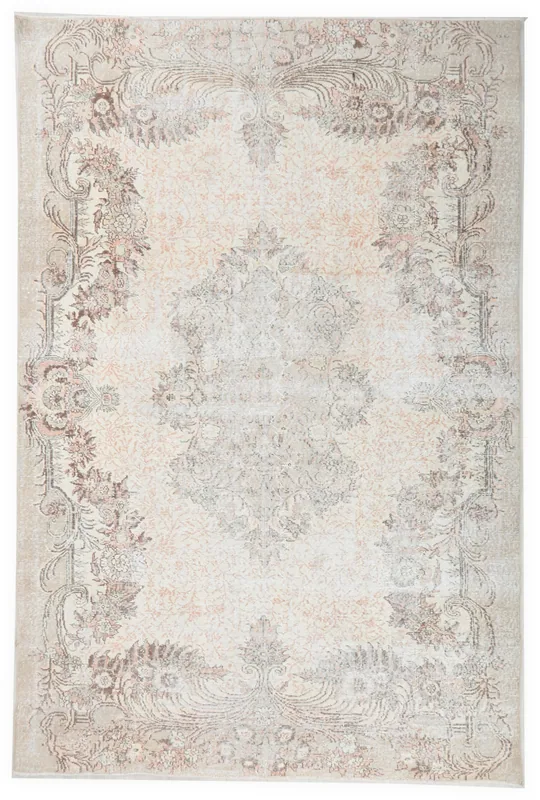 Full overhead view of the ivory and rose vintage Anatolian area rug on a white background