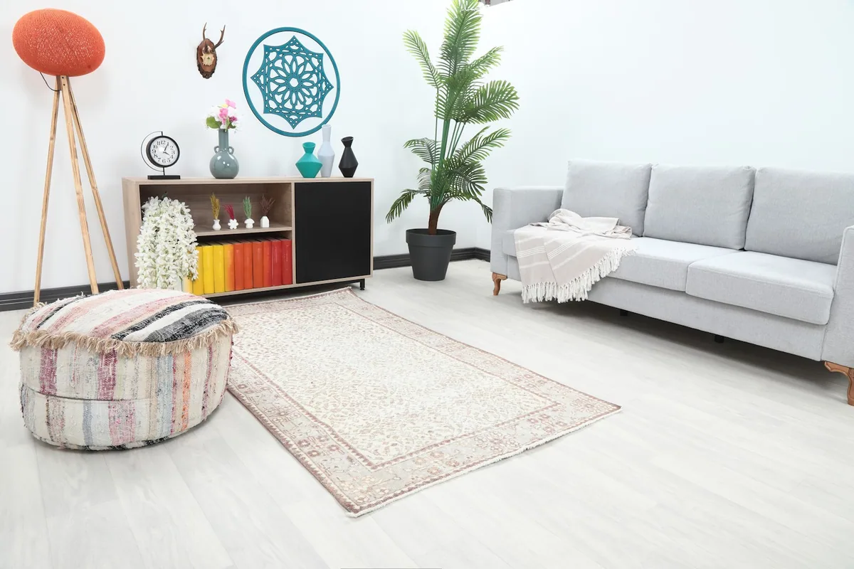 Angle view of the small Anatolian rug placed in a living space with contemporary furniture