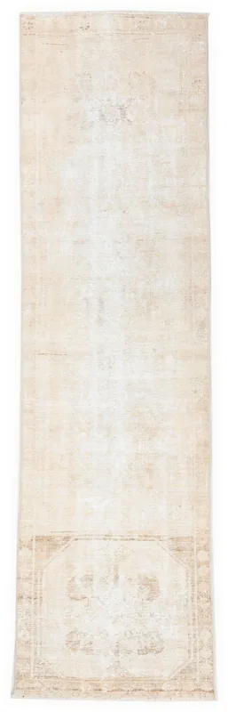 Full top view of the beige vintage Anatolian runner rug with subtle geometric patterns