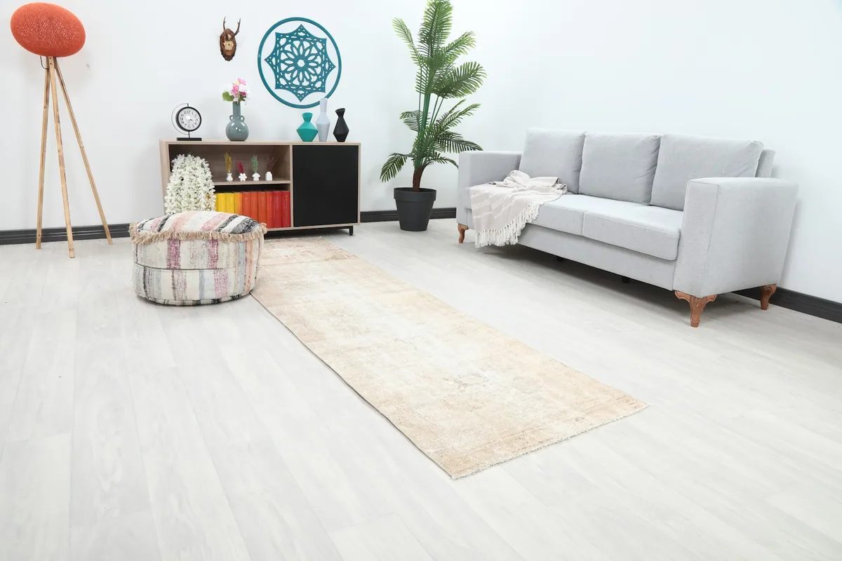 Angle view of the runner rug in a room with light flooring and contemporary furniture