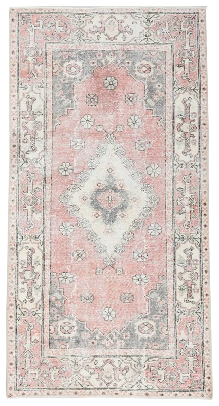 Full top view of the vintage rose, gray, and ivory Anatolian rug