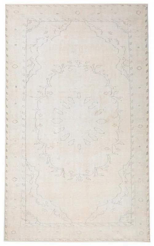 Full top view of the 5'9" x 9'5" ivory geometric medallion rug on a white background.