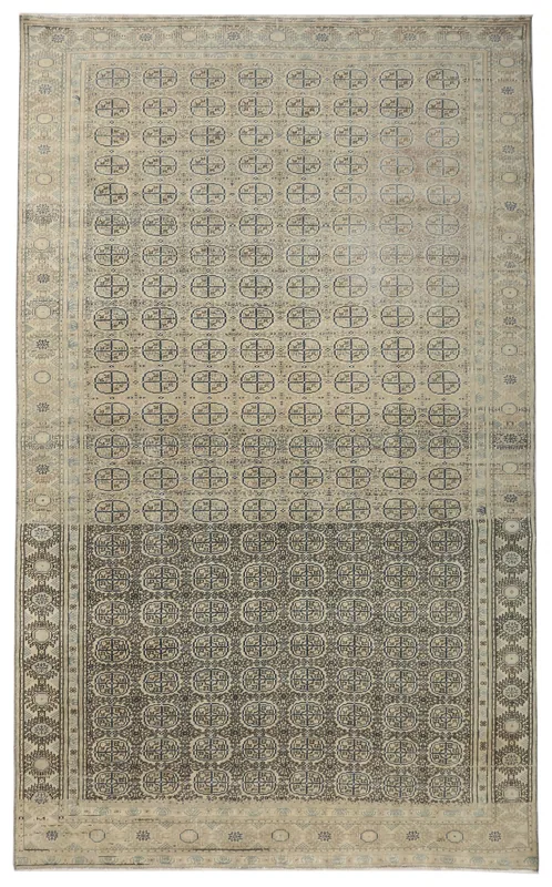 Full top view of the 6'1" x 9'7" beige and gray geometric vintage Anatolian area rug on a white background.