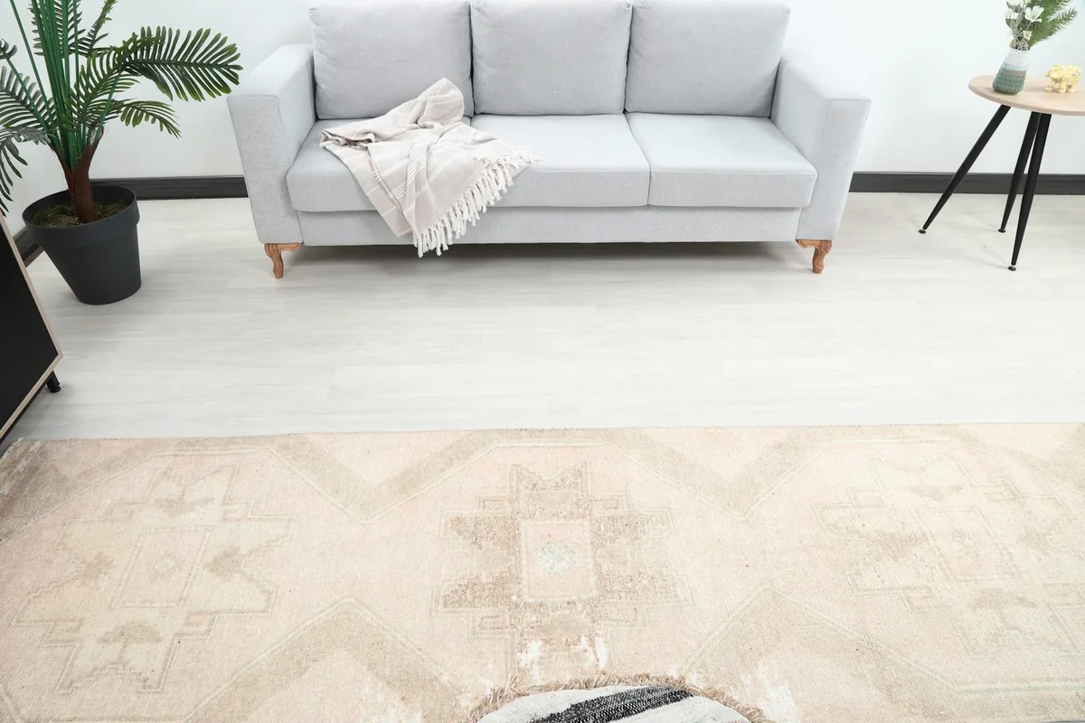 Overhead view of the middle section of the runner rug, showing its interaction with room furniture.