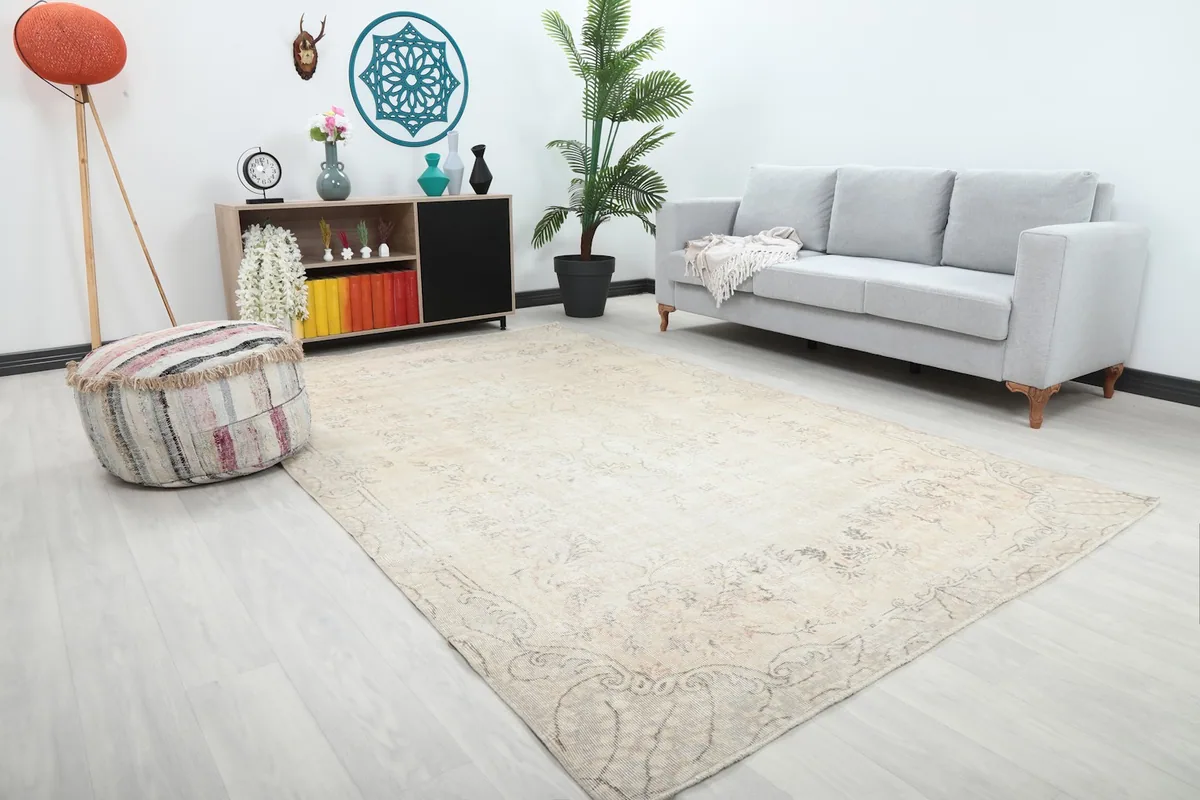 Angled room view showing the vintage wool rug complementing a modern living room setup.