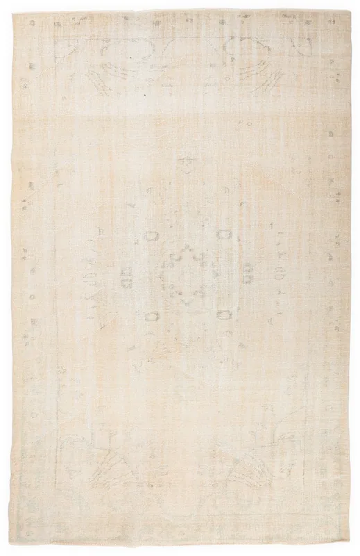 Full top view of the beige and cream vintage Anatolian area rug with faint geometric patterns