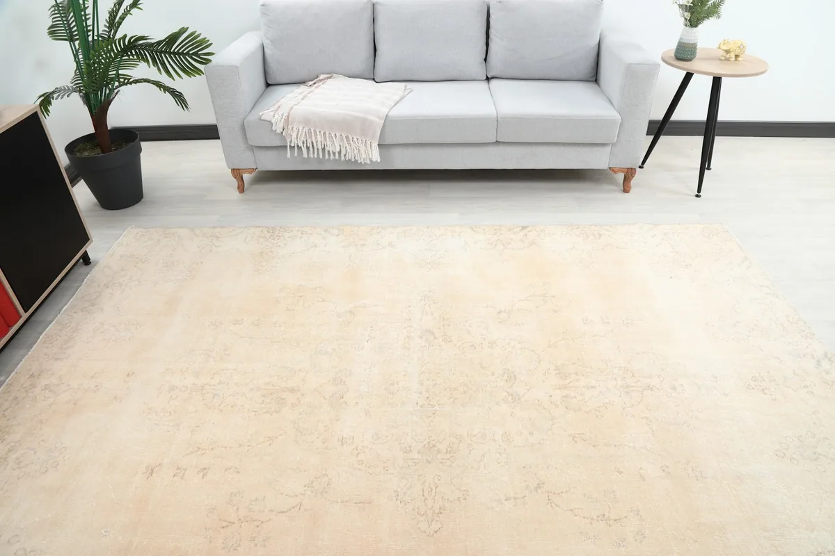 Overhead view of the ivory rug showing its full placement in a living area