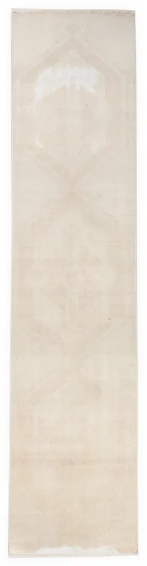 Full top view of the 2'8" x 11'11" cream and beige vintage runner rug with faded medallion pattern