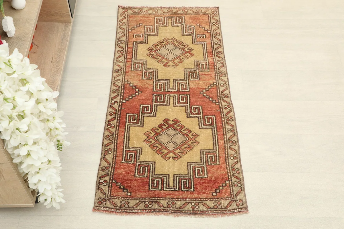 Direct overhead shot showcasing the full design of the hand-knotted wool rug.