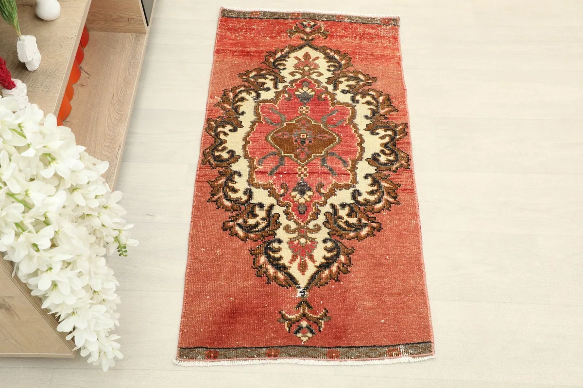 Overhead view of the small hand-knotted rug, highlighting its central medallion