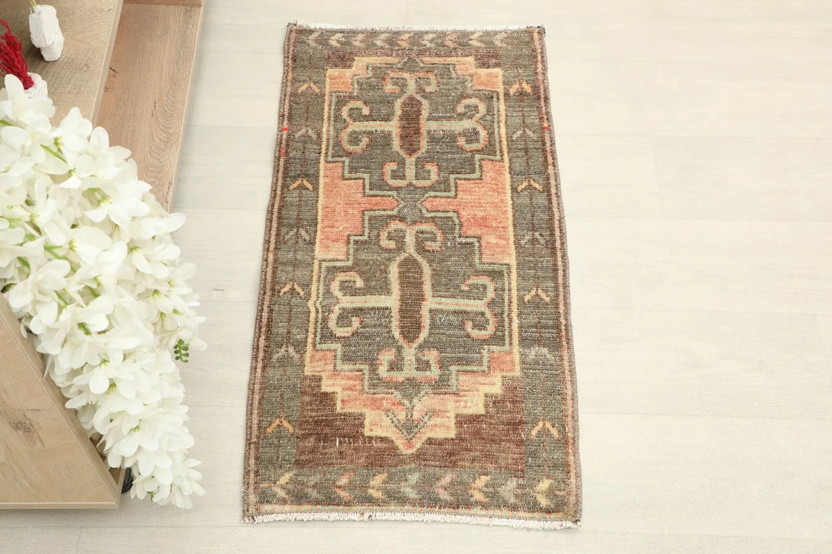 Overhead view of the hand-knotted brown and rust Anatolian rug