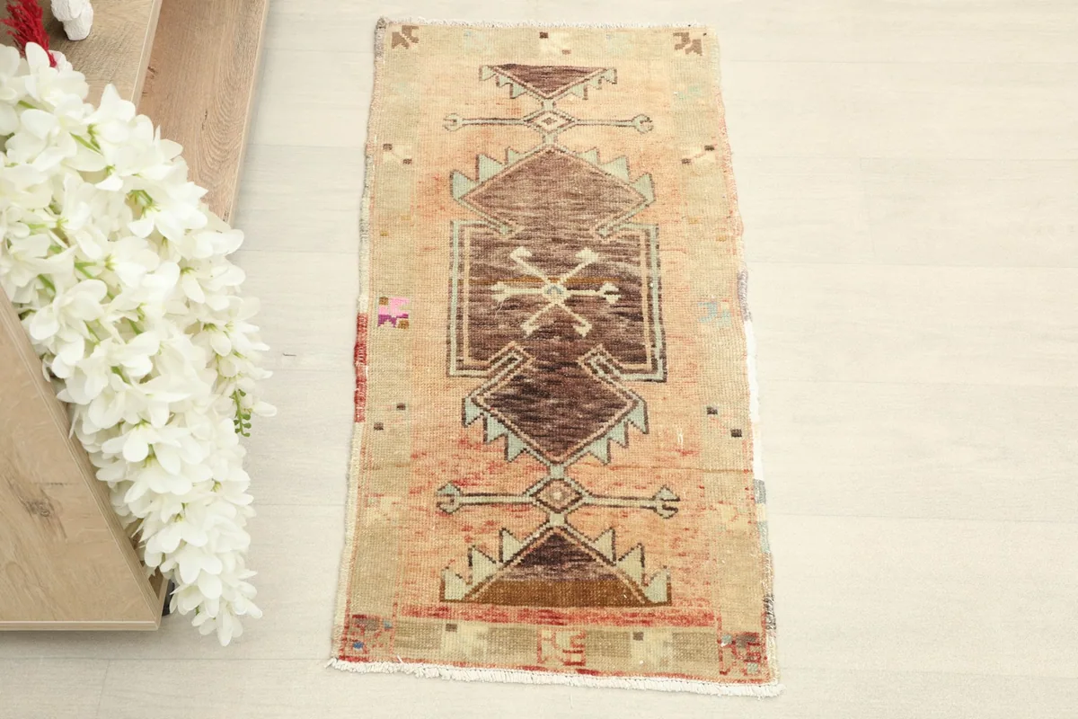 Overhead view showcasing the full length and geometric pattern of the vintage Anatolian rug.