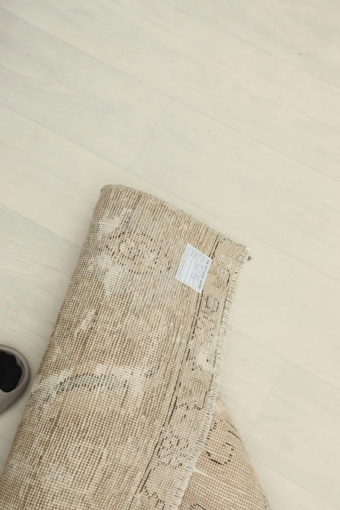 Overhead view of the rug's back, with a small label visible
