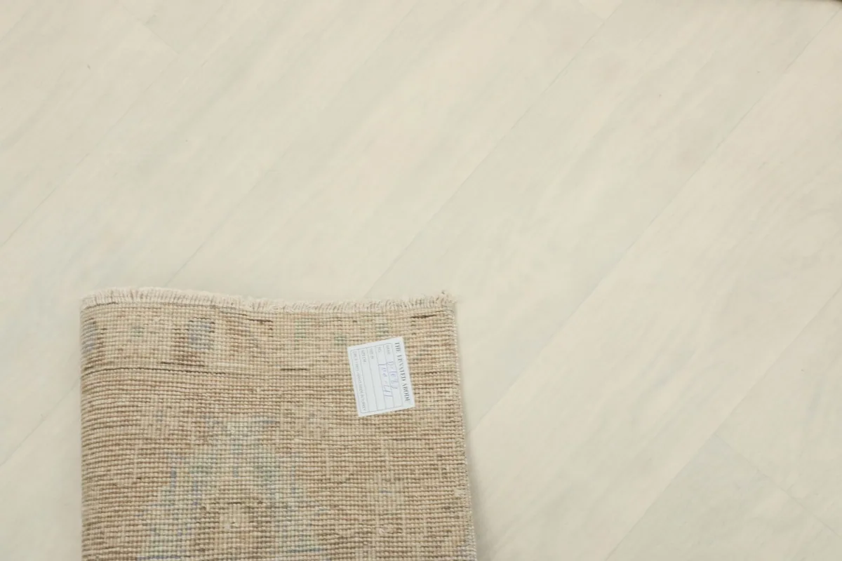 Overhead view of the rug's back, showing the consistent hand-knotted structure