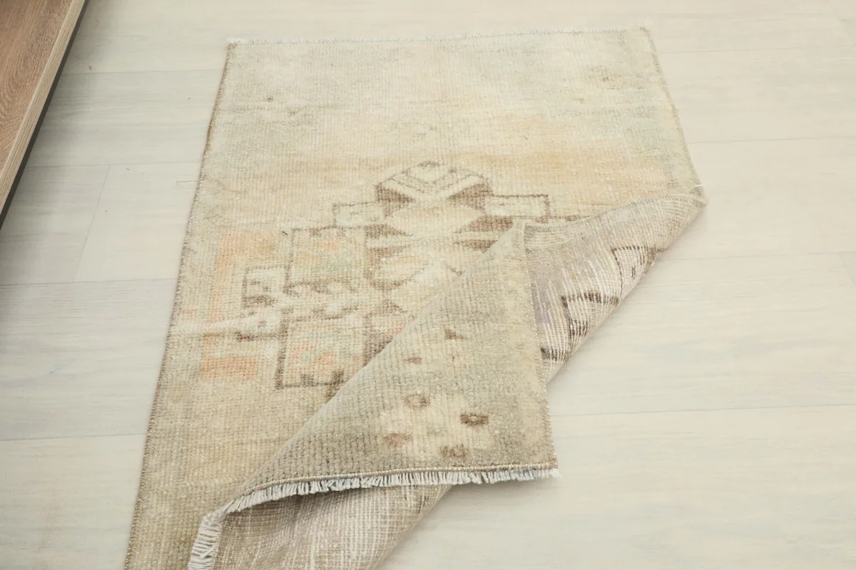 The rug folded to show its flexibility and thickness
