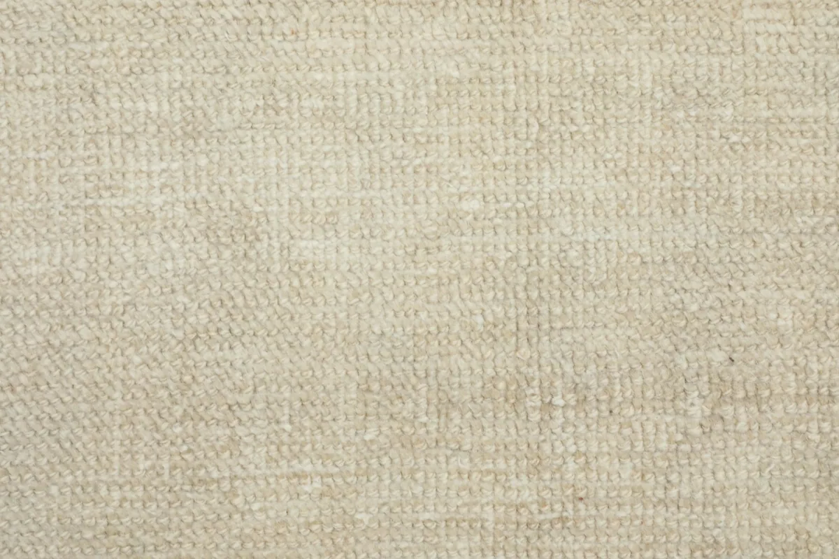 Detailed close-up of the wool pile showing the texture and tight knotting
