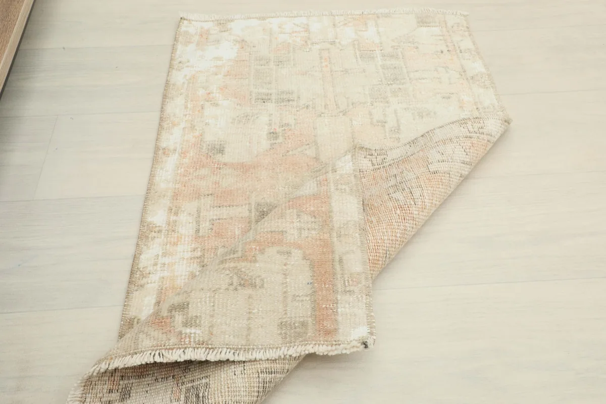 Partial fold of the rug, illustrating the flexibility and construction from the side