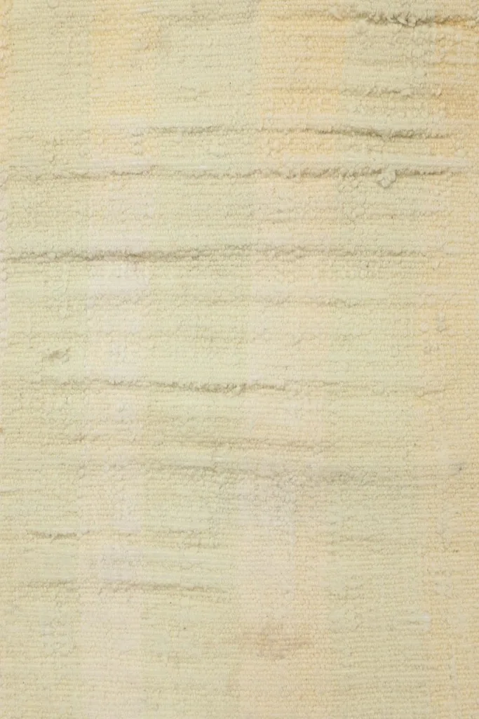 Direct overhead view showing the full surface and subtle color shifts across the rug's pile.