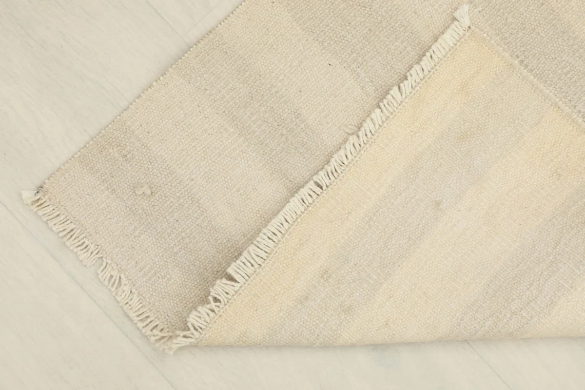 Another view of the back of the rug, highlighting its construction