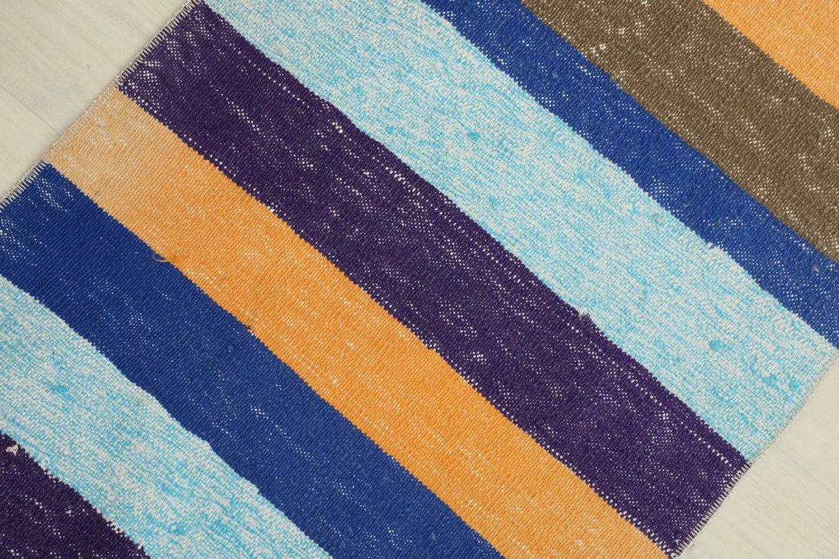 Overhead view from an angle, showing the full striped pattern and color variations.