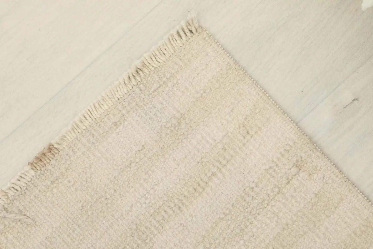 Another angled view, showcasing the rug's overall appearance and the gentle patina.