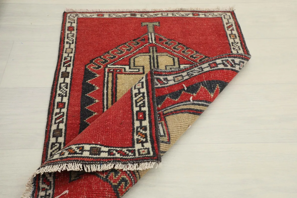 Another folded view of the doormat, showing the flexibility and construction of the rug.