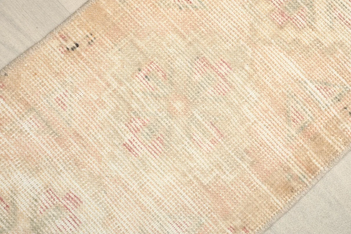 Detailed view of the low wool pile and texture of the vintage Anatolian rug