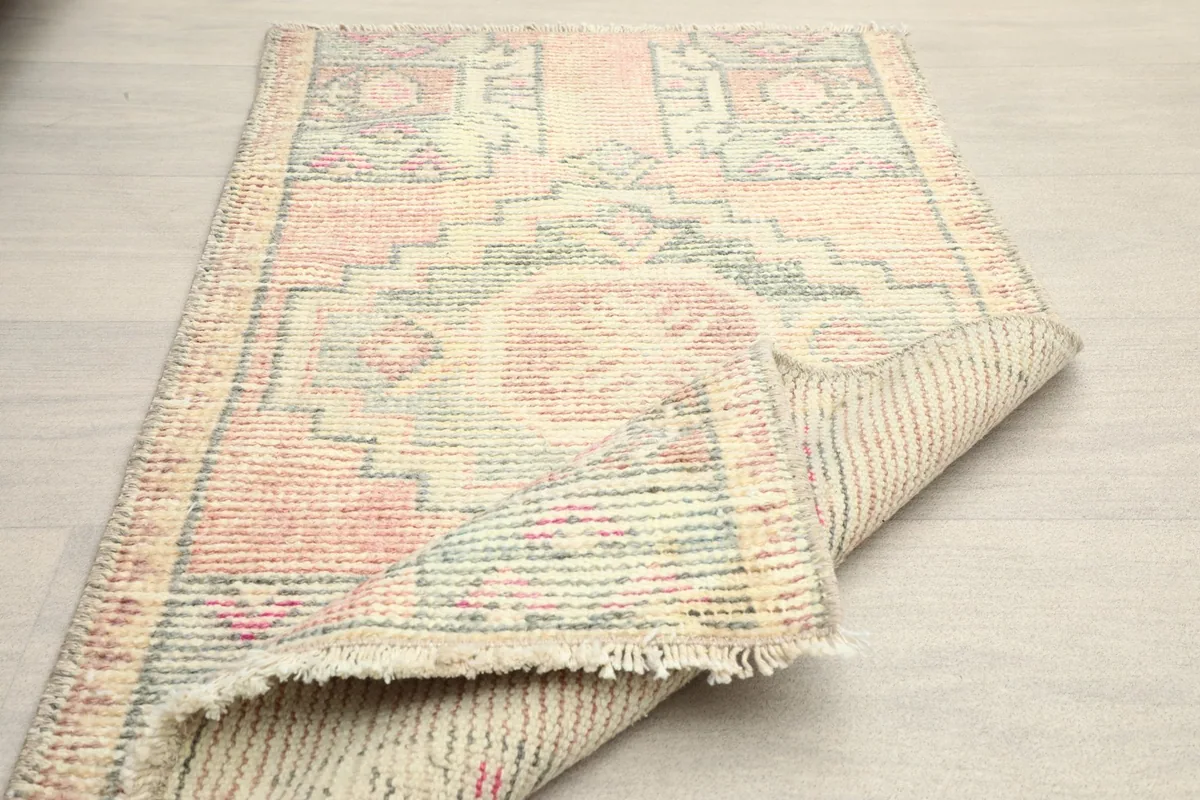 Another folded view of the rug, emphasizing its flexibility and construction