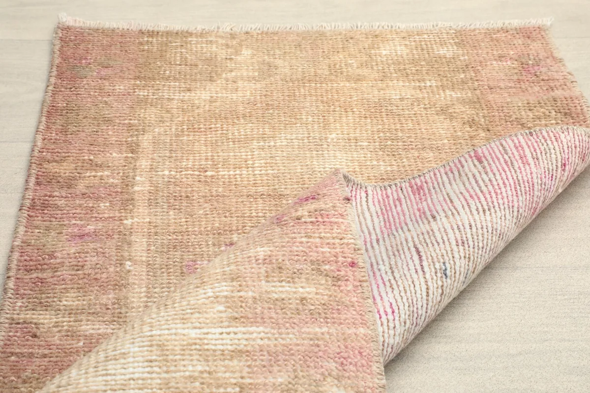 Another view of the back of the rug, illustrating the dense knotting and craftsmanship.