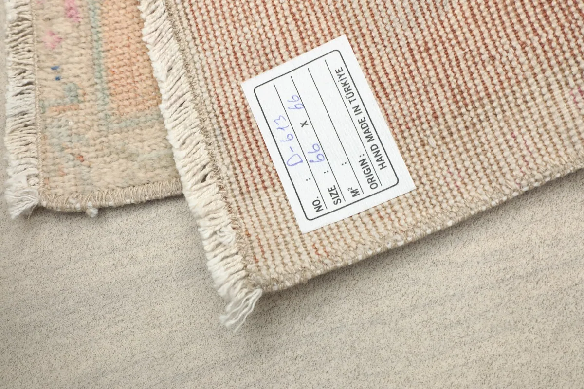Label on the back of the rug indicating its origin from Turkey and dimensions