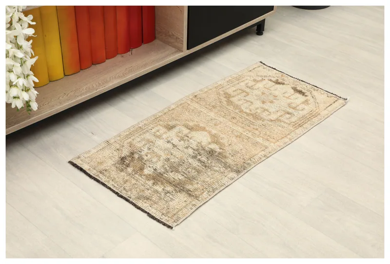 Full top view of the beige and brown distressed vintage Anatolian doormat