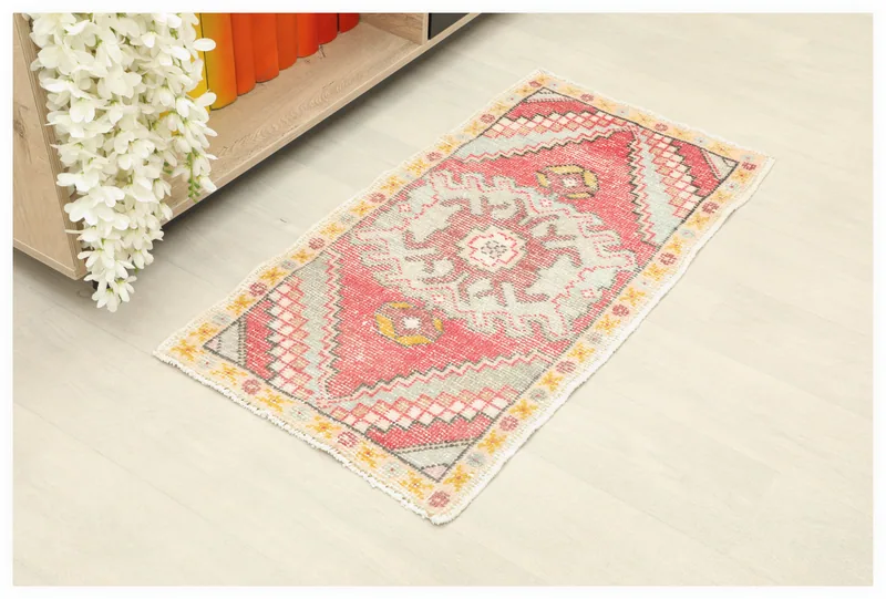 Full top view of the 2x3 rose and gray geometric vintage Anatolian doormat