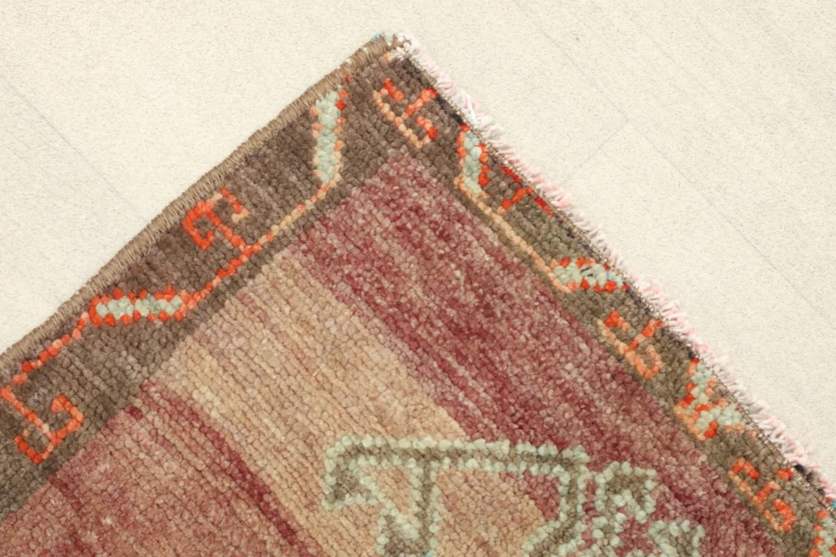 Corner view showing the subtle brown border and the field's color variations.
