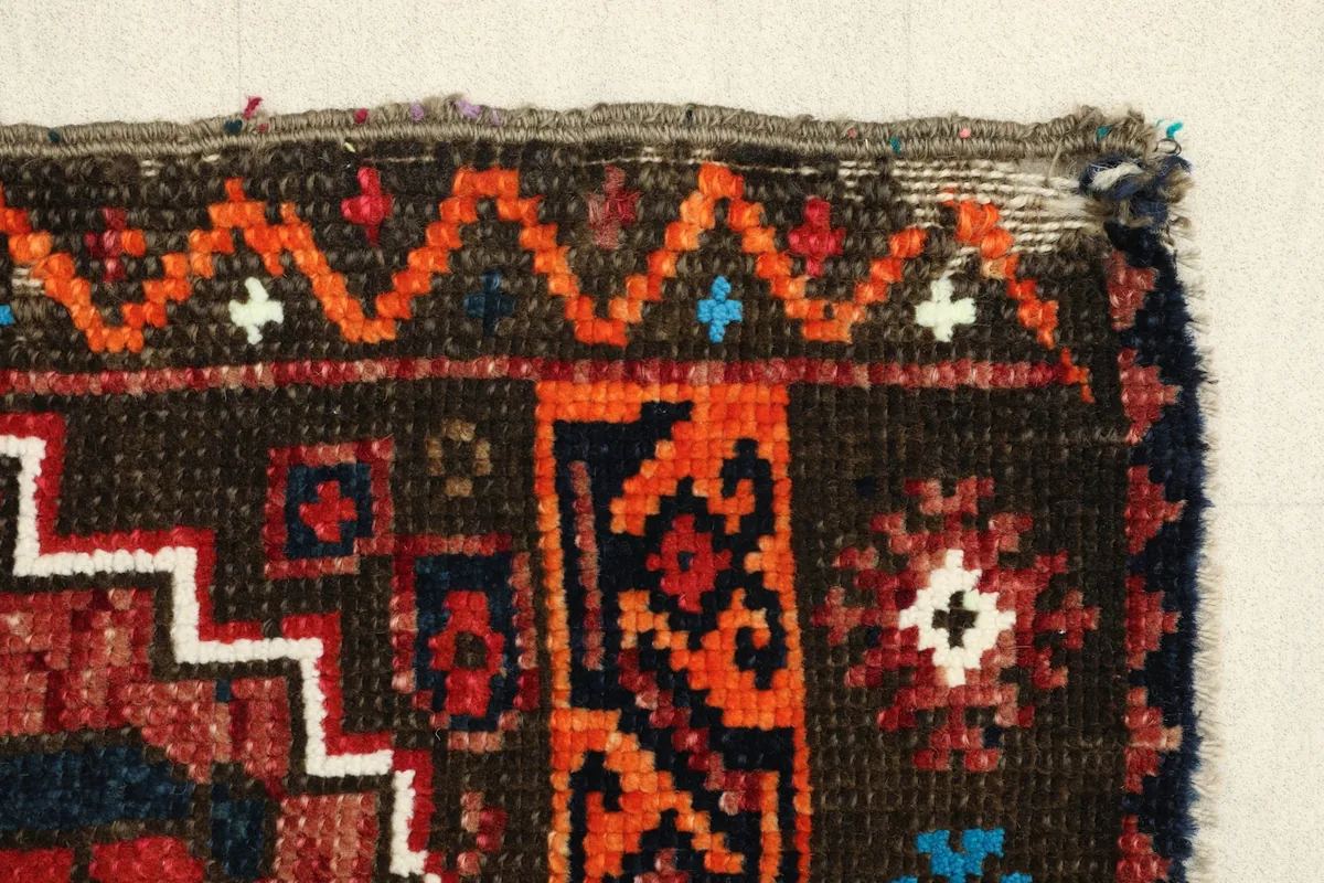 Another border detail highlighting the geometric designs and rich colors