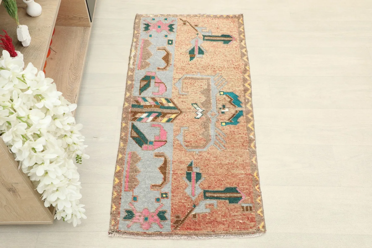 Overhead view of the vintage Anatolian rug, showcasing its full design and colors.