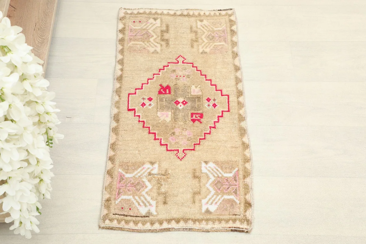 Overhead view of the doormat, showing the central rose geometric medallion