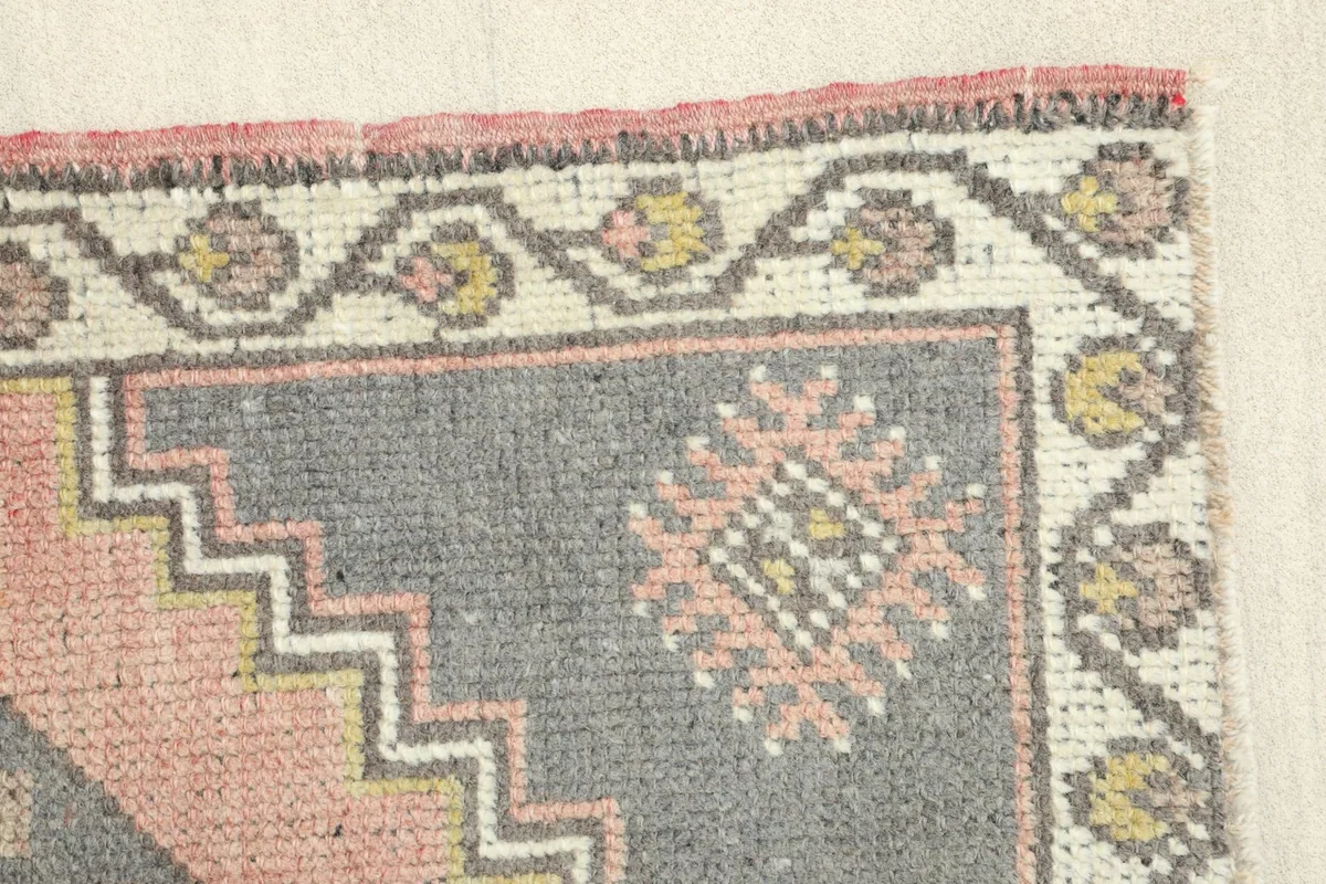 Close-up of a side border section, revealing tribal patterns and subtle color shifts.