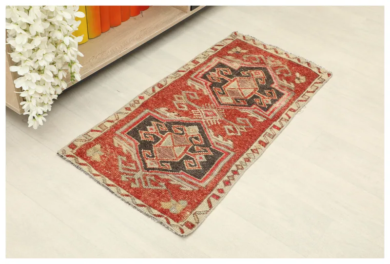 Full overhead view of the Red Black Geometric Anatolian Rug on a white background, displaying its entire pattern.