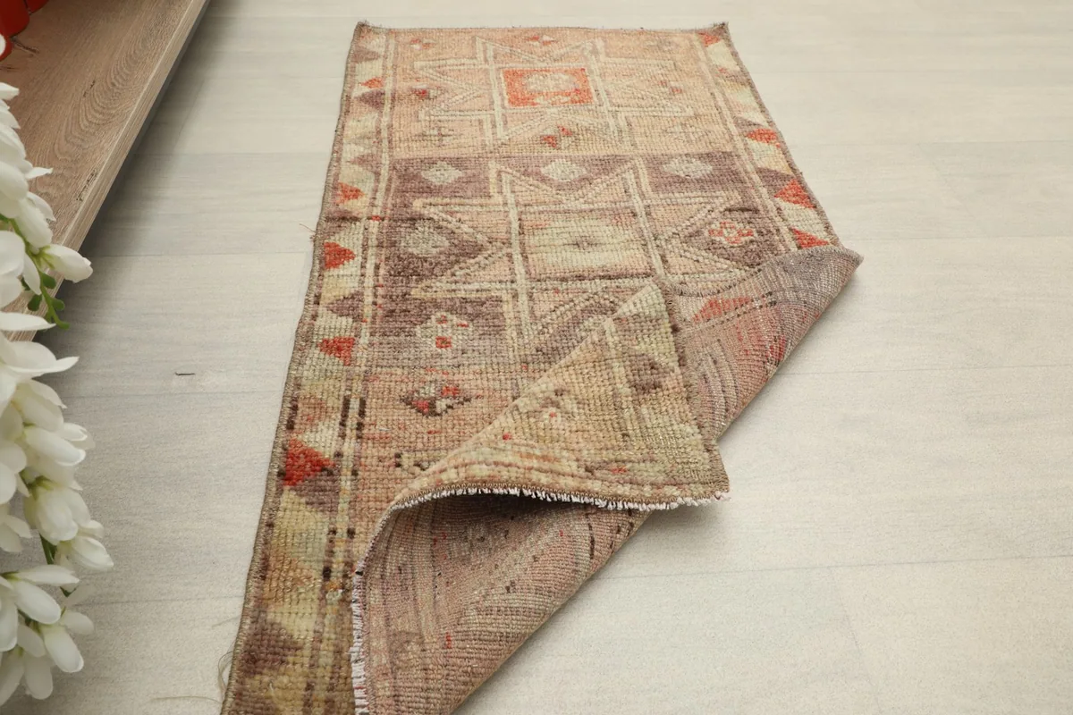Another folded view of the rug, illustrating its flexibility and construction.