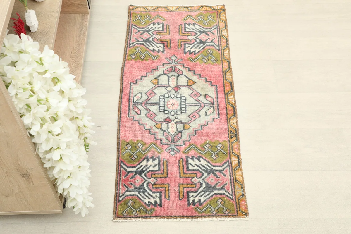 Overhead view of the 1x3 rose doormat, showcasing its full design and colors.