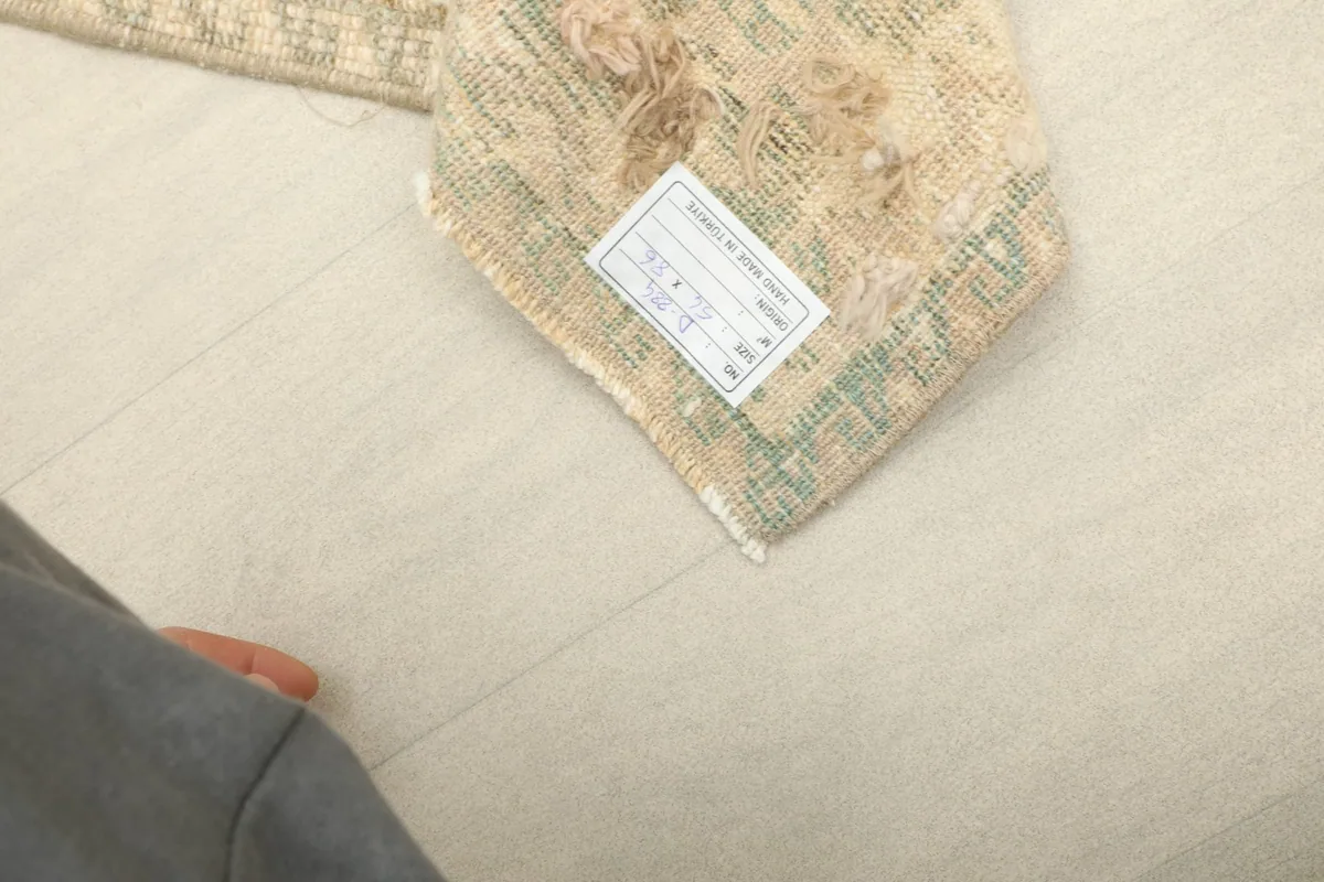 Detail of the product label attached to the back of the vintage Anatolian rug.