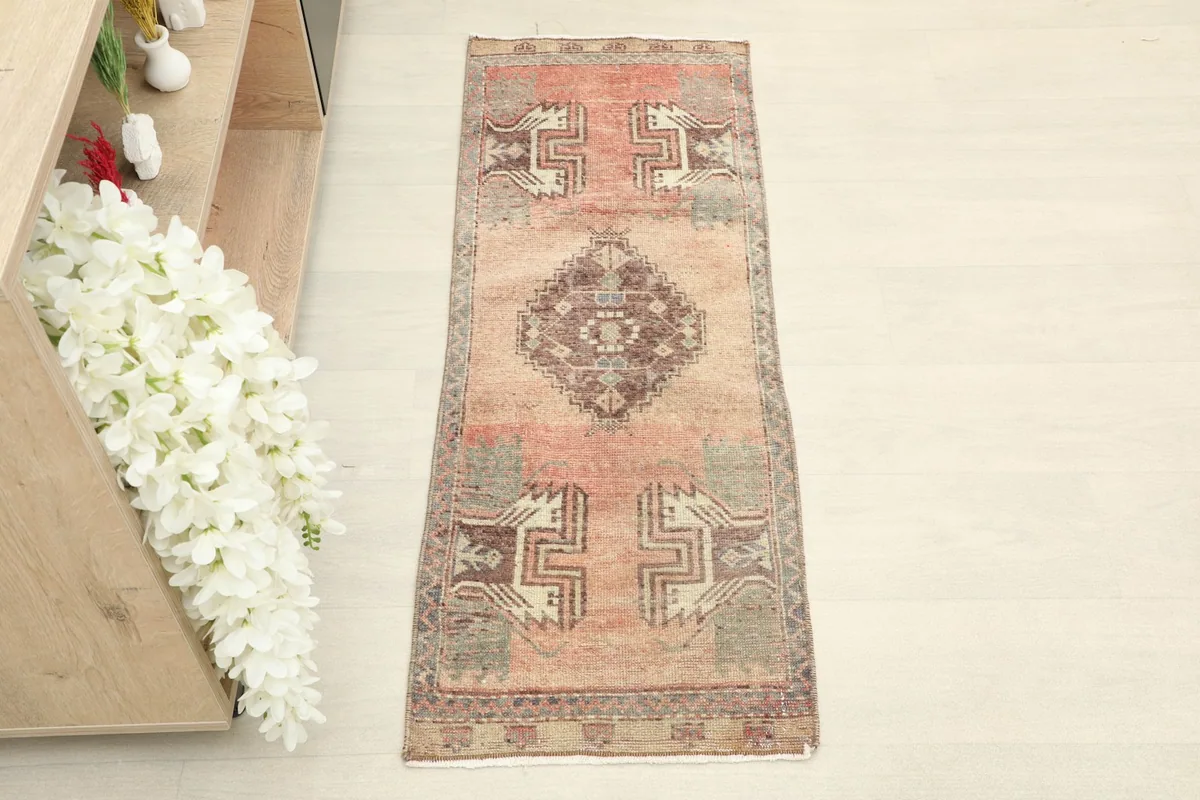 Overhead view of the vintage runner showcasing its full design and faded colors
