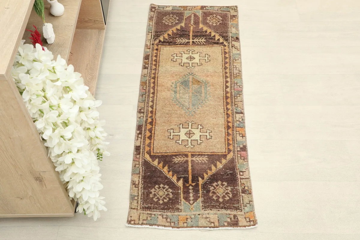 Overhead view of the hand-knotted vintage Anatolian runner, showing its full design.