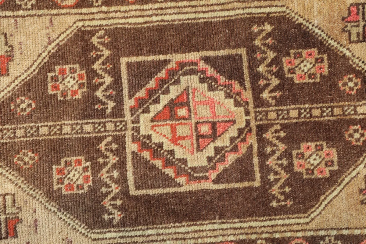 Detailed shot of the central geometric motif and color variations